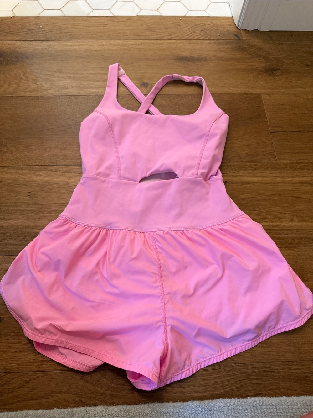 Pink Athletic Romper with Skirted Shorts
